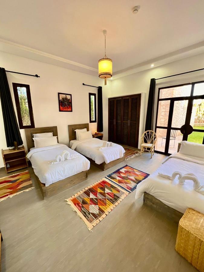 Chambre Triple avec Terrasse